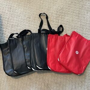 7 small Lululemon shopping bags